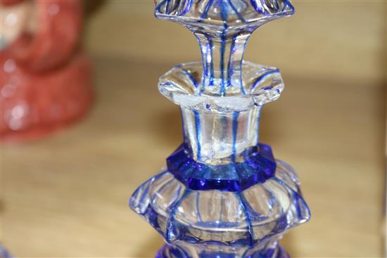 A pair of Bohemian blue flash cut glass perfume bottles H.19.5cm
